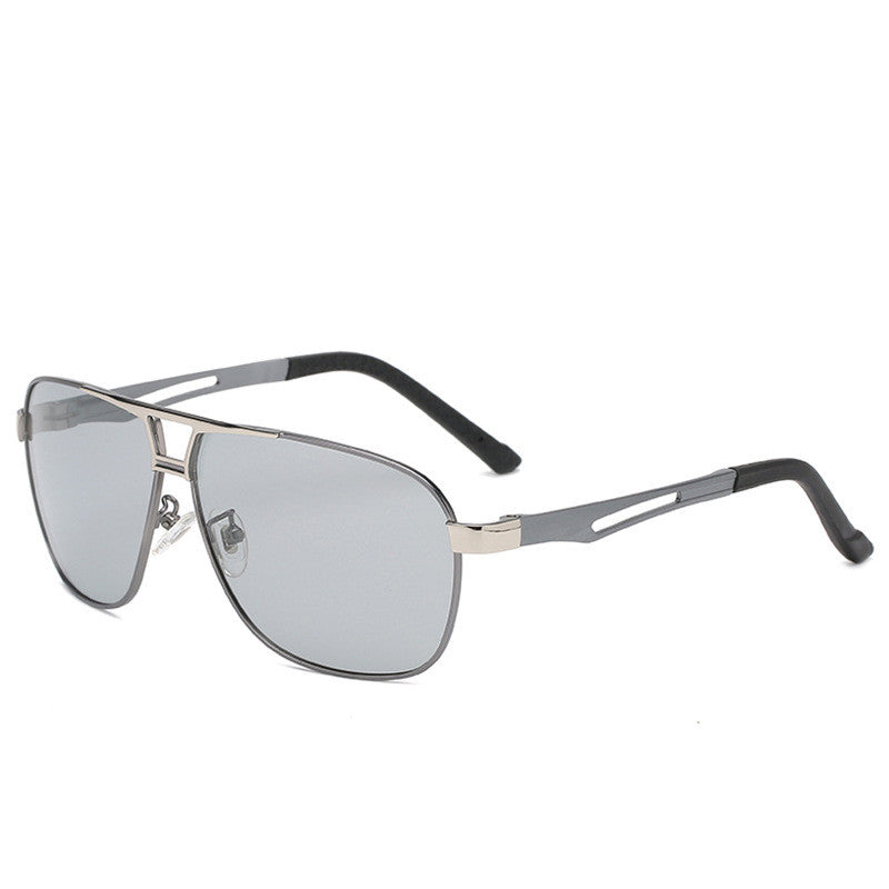 Aviator sunglasses with silver metal frame and gray lenses on white background, FashionRay style