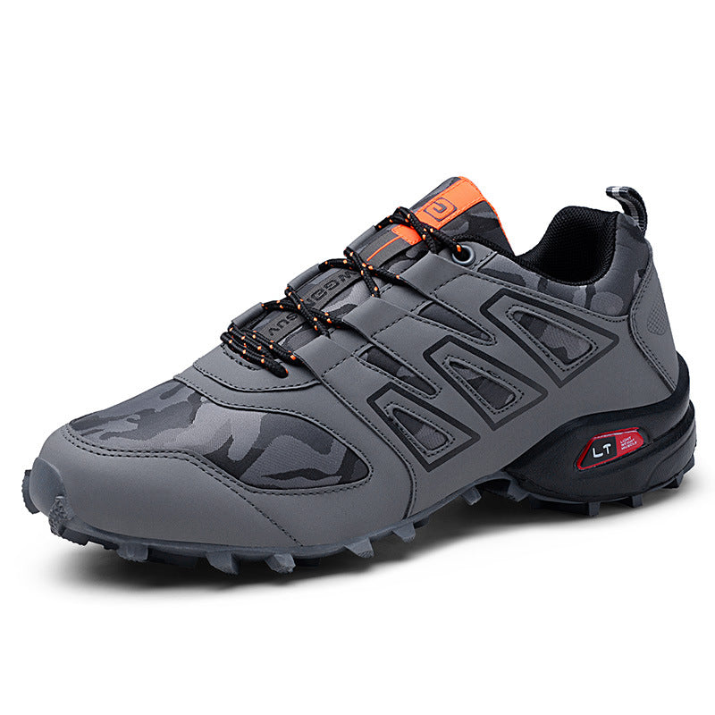 Men's gray athletic sneaker with camouflage accents and orange details from FashionRay