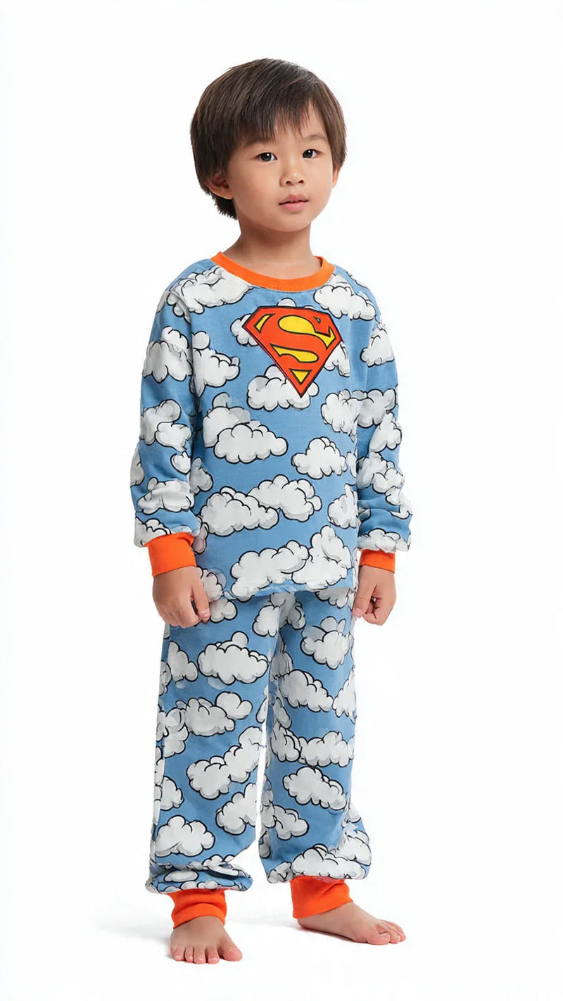 Child wearing blue cloud-patterned superhero pajamas from FashionRay