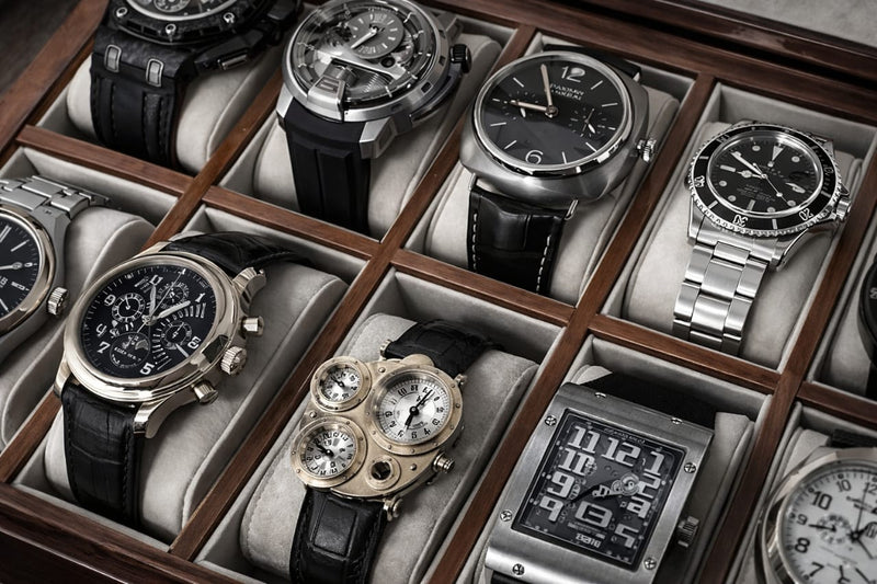 Men’s gold metal smartwatch with digital clock face, worn with light casual clothing at FashionRay