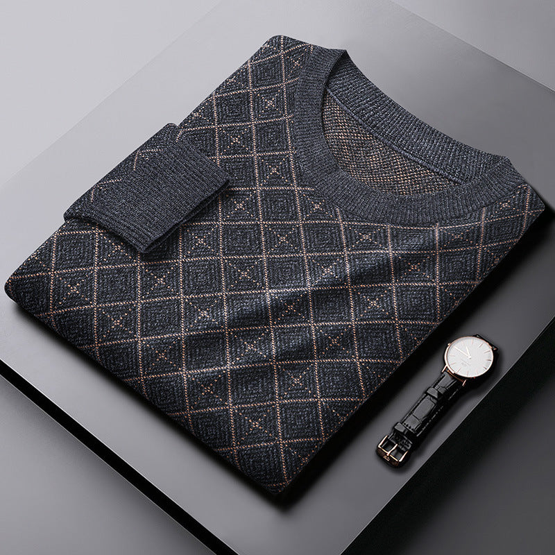 Folded dark patterned sweater with diamond design and wristwatch on gray surface, FashionRay style
