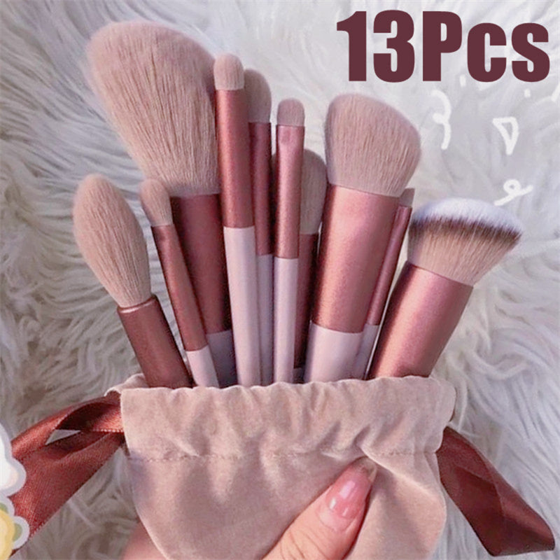 FashionRay 13-piece pink makeup brush set in velvet pouch on soft white background