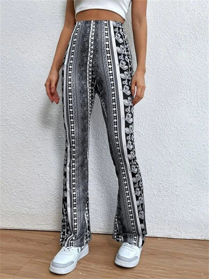 Woman wearing high-waisted black and white patterned flare pants from FashionRay