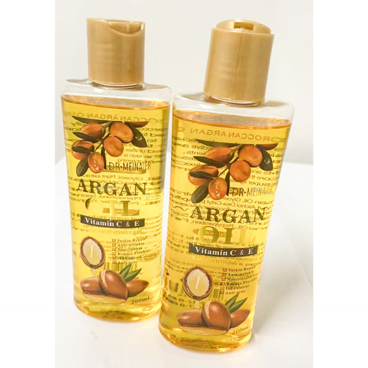 Dr. Meinaier Argan oil bottles with Vitamin C & E, skincare product on FashionRay