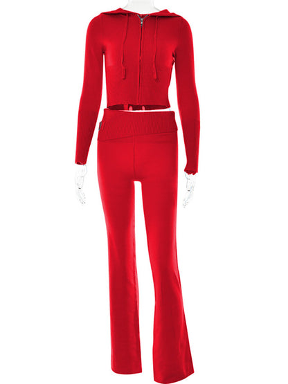 Red two-piece set with zip-up crop hoodie and flared pants on mannequin, FashionRay style