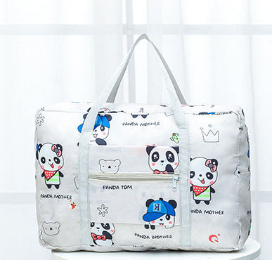 White travel bag with cute panda cartoon print, front zipper pocket, and dual handles