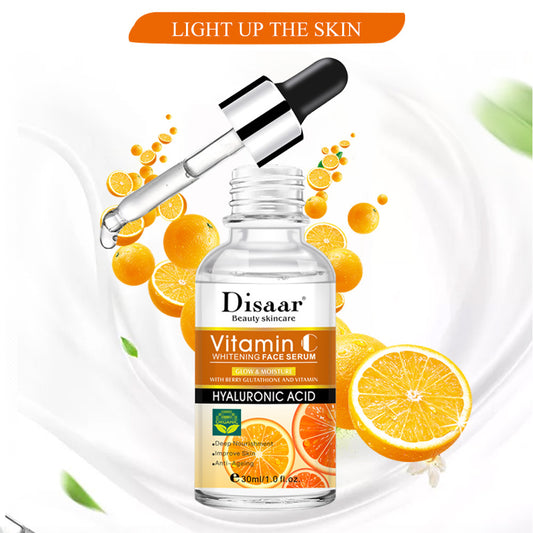 Disaar Vitamin C whitening face serum bottle with dropper, oranges, and skincare highlights