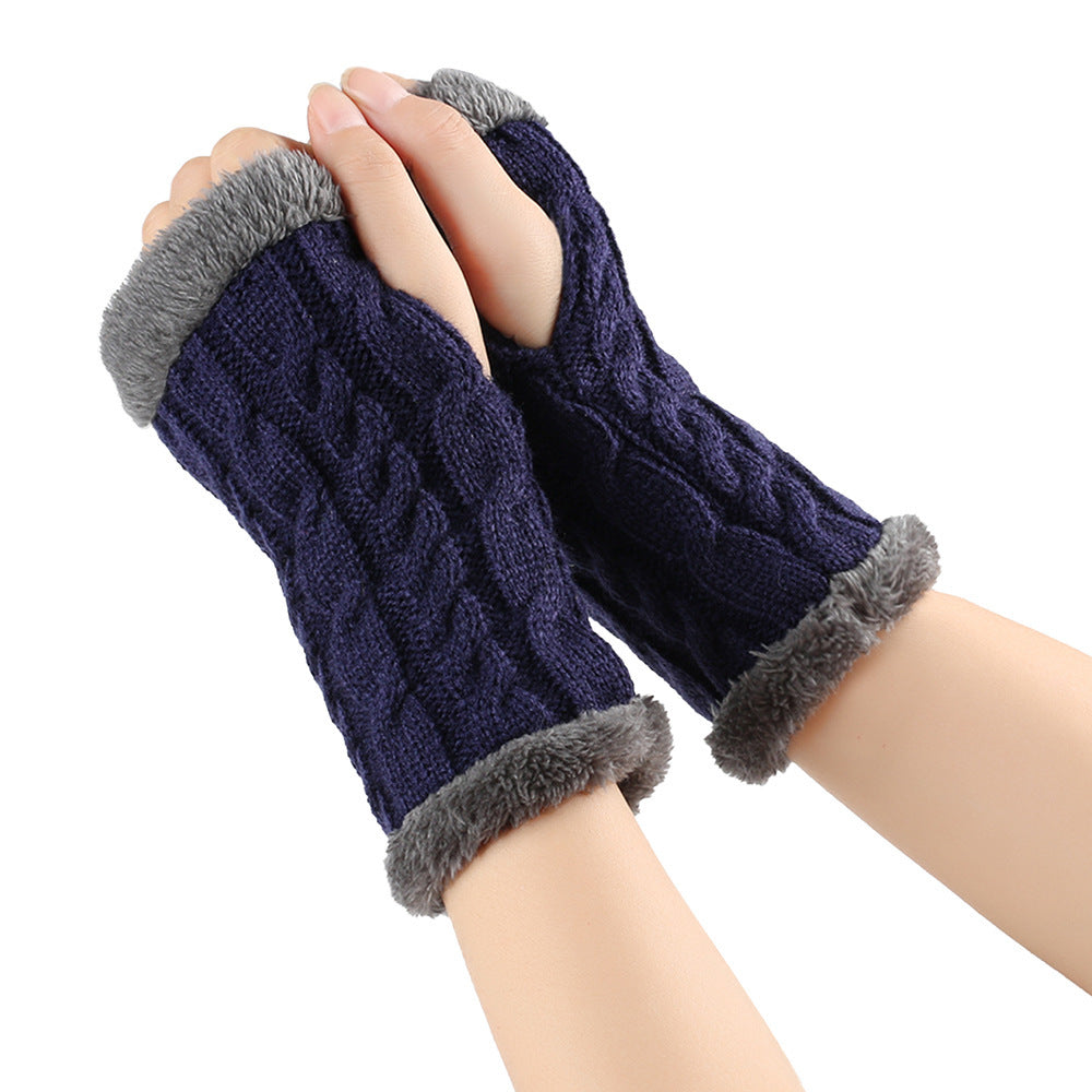 FashionRay navy blue cable knit fingerless gloves with gray faux fur trim, worn on hands