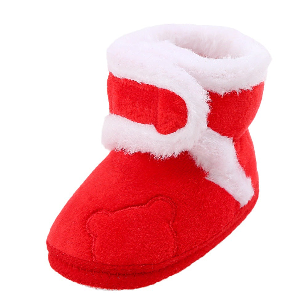 Red baby bootie with white faux fur trim and bear detail, cozy fashion from FashionRay