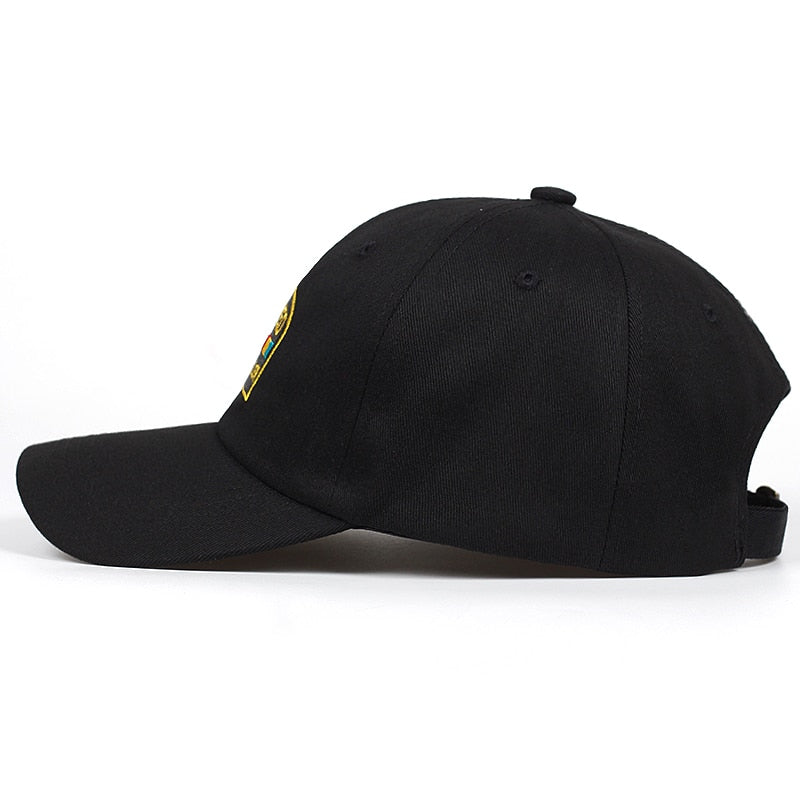 Black baseball cap with yellow embroidered patch, trendy casual style from FashionRay