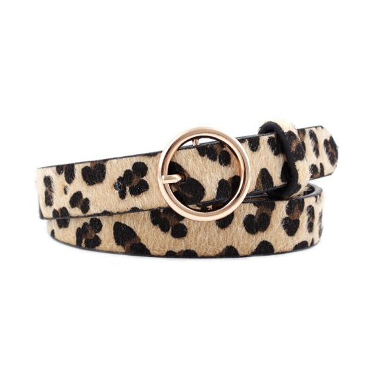 Leopard print skinny belt with gold round buckle, trendy accessory at FashionRay