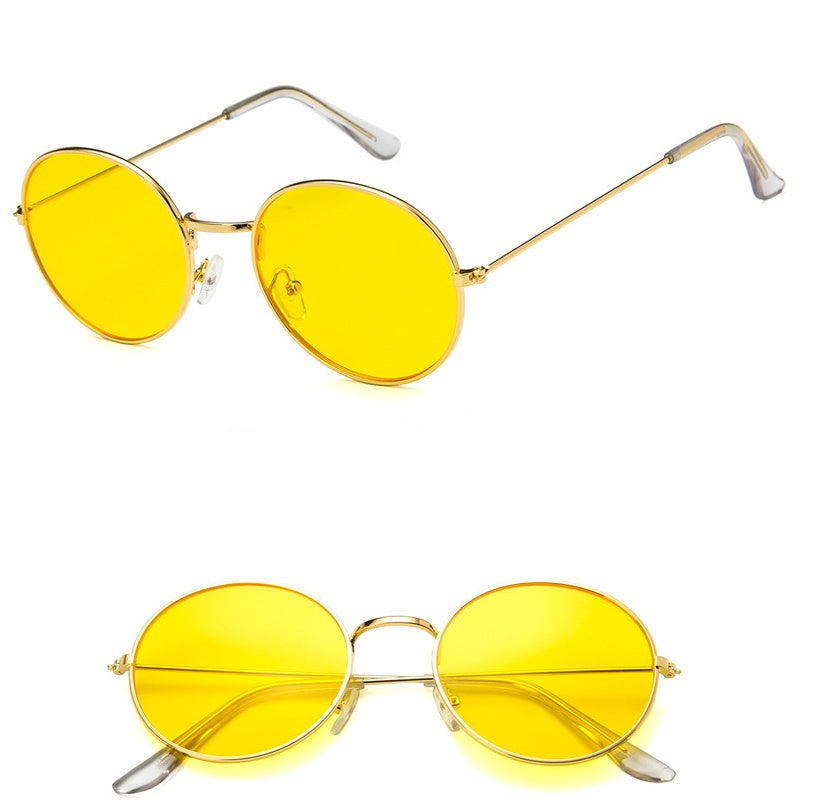 Round yellow lens sunglasses with thin gold metal frame on white background, FashionRay accessory