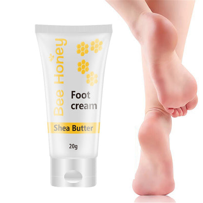 Bee Honey Shea Butter Foot Cream tube beside smooth bare feet, FashionRay skincare product