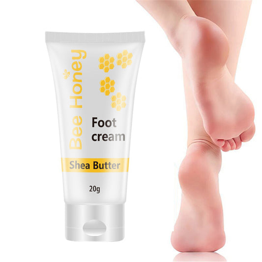 Bee Honey Shea Butter Foot Cream tube beside smooth bare feet, FashionRay skincare product