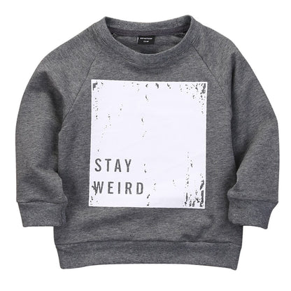 Gray FashionRay sweatshirt with 'STAY WEIRD' print, trendy casual kids' fashion style.