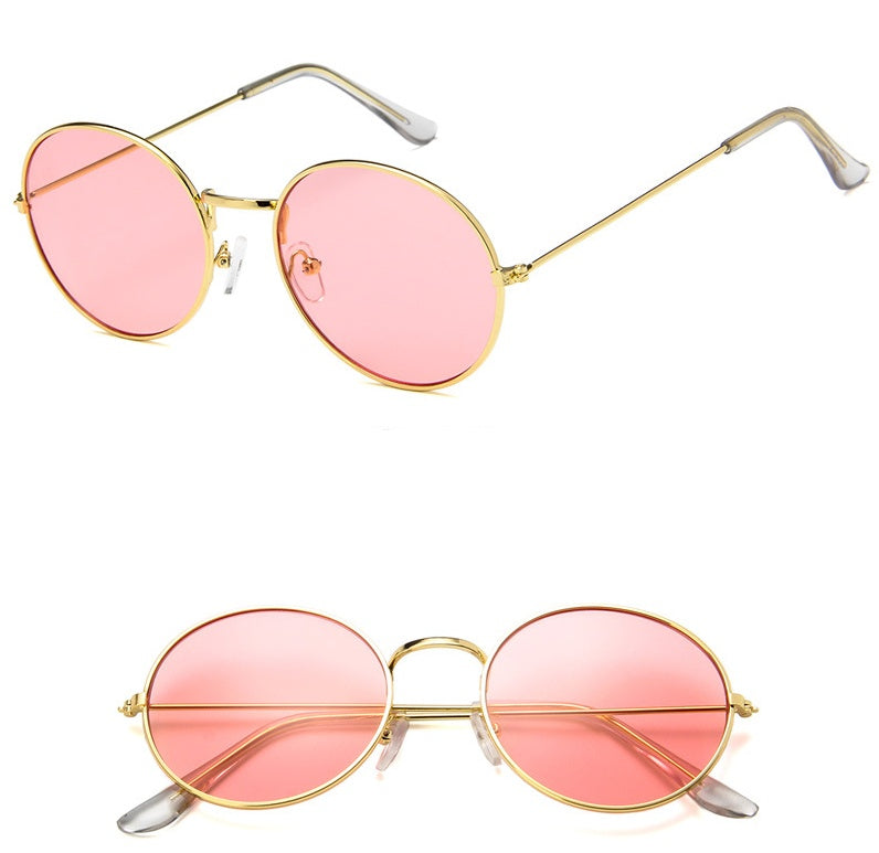 Round gold-frame sunglasses with pink lenses, trendy eyewear at FashionRay.