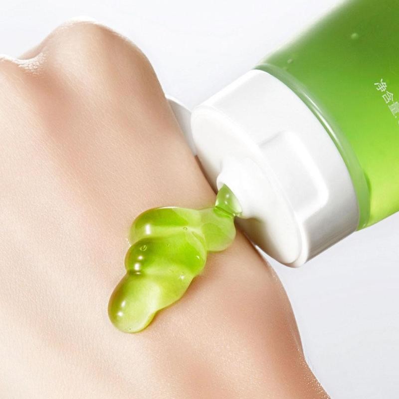 Green gel skincare product squeezed onto hand, FashionRay beauty and comfort focus.