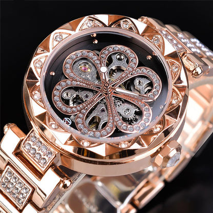 FashionRay rose gold women’s watch with crystal accents and open gear design