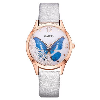 Rose gold women's watch with blue butterfly dial and silver strap, FashionRay accessory