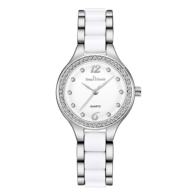 Elegant women's silver and white quartz watch with crystal accents from FashionRay
