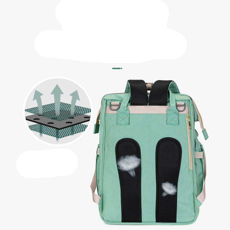Mint green backpack with breathable mesh back panels, comfortable and ergonomic design.