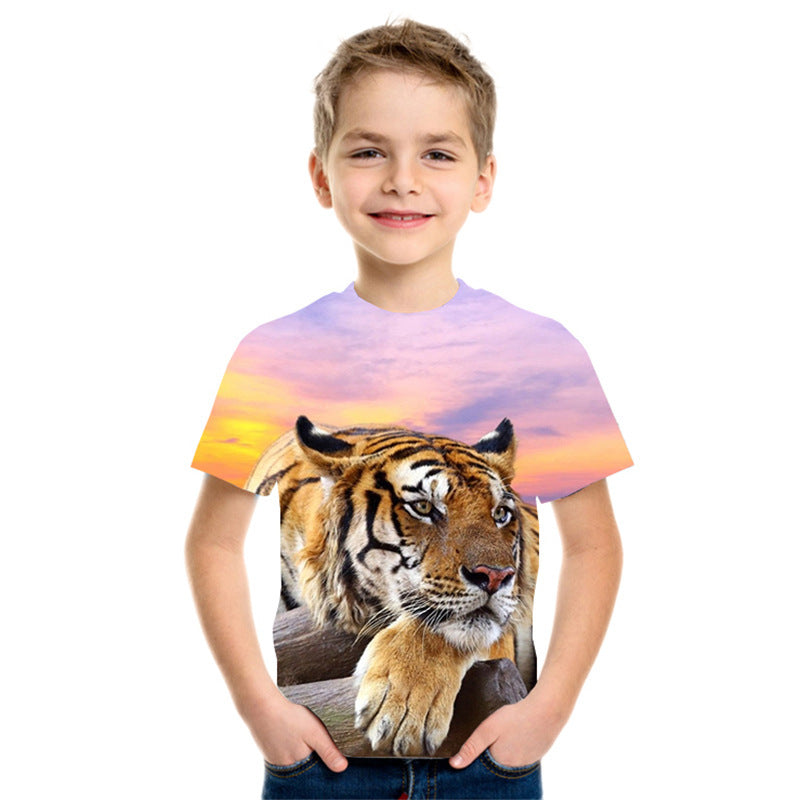 Smiling boy wearing a vibrant tiger print T-shirt with sunset background, FashionRay style