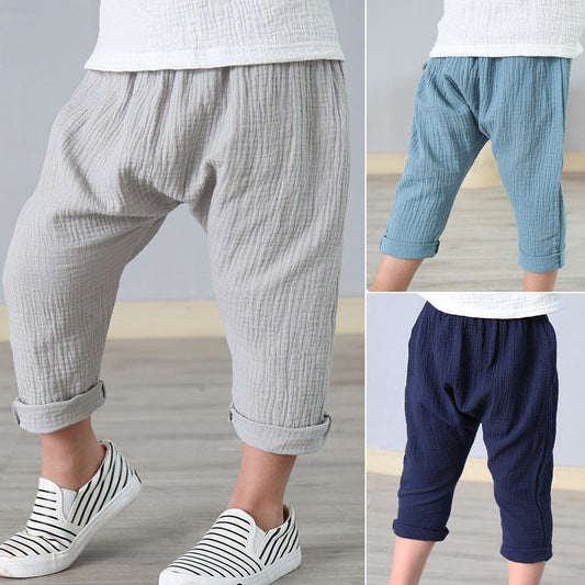 Kids wearing loose, lightweight cotton pants in gray, blue, and navy from FashionRay