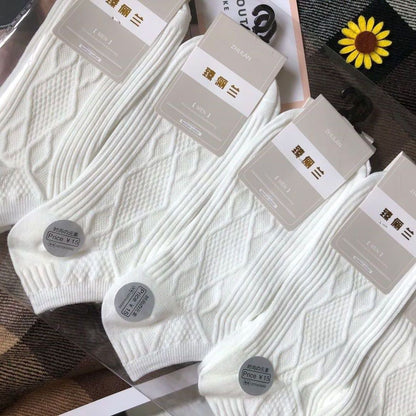 FashionRay white men's textured socks in retail packaging, displayed on a patterned surface