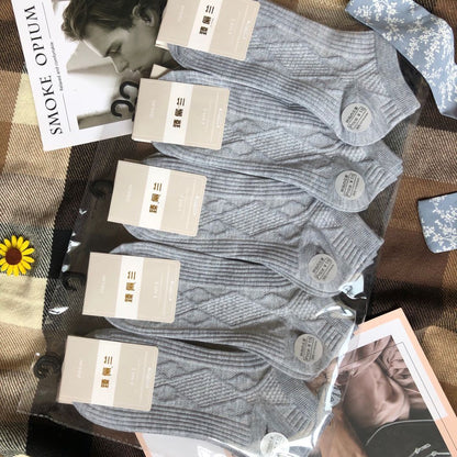 FashionRay gray ribbed socks multi-pack on plaid blanket, trendy modern accessories