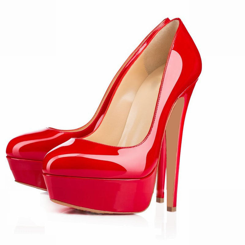 Shiny red platform high heels with stiletto heels on white background, FashionRay style