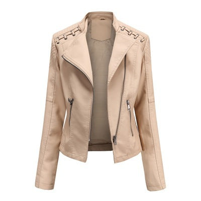 Beige faux leather moto jacket with zipper pockets and lace-up shoulder detail from FashionRay