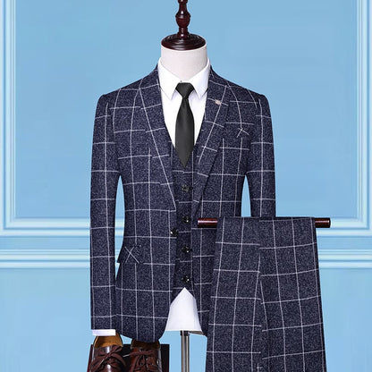 Navy blue plaid suit with white shirt and black tie on mannequin, FashionRay trendy menswear.