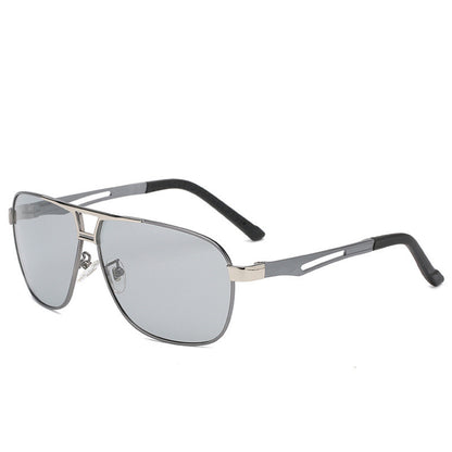 Aviator sunglasses with silver metal frame and gray lenses on white background, FashionRay style