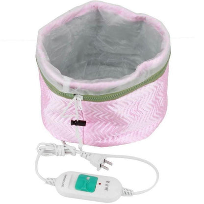 Pink electric hair steamer cap with control switch, ideal for at-home hair treatments