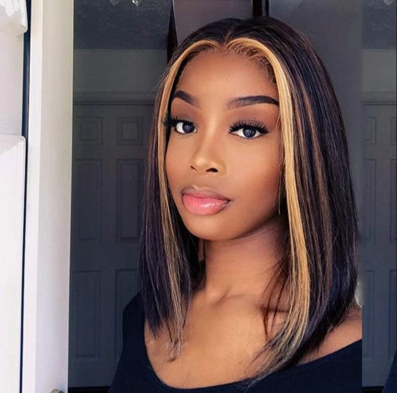 Woman with shoulder-length straight hair and blonde highlights wearing black top, FashionRay style