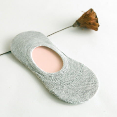 Gray fashion no-show sock on white background, FashionRay style, minimalist comfort