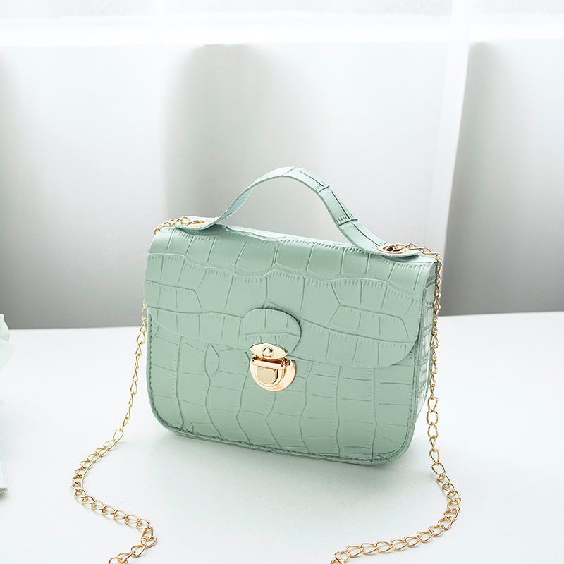 Mint green crocodile-pattern crossbody bag with gold chain and clasp, FashionRay style
