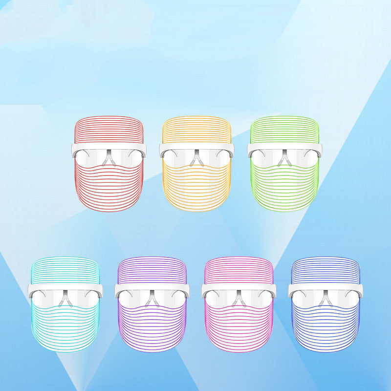 Six colorful LED face masks with futuristic design on a blue geometric background, FashionRay