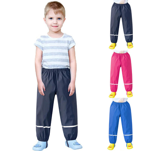 Child modeling striped shirt and navy waterproof pants, with rain pants in navy, pink, and blue variants