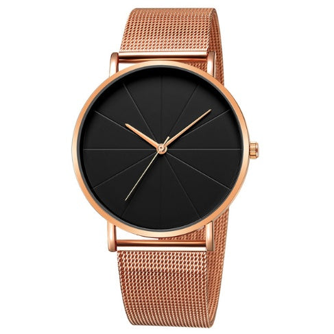 Minimalist rose gold mesh band watch with black face, stylish accessory at FashionRay