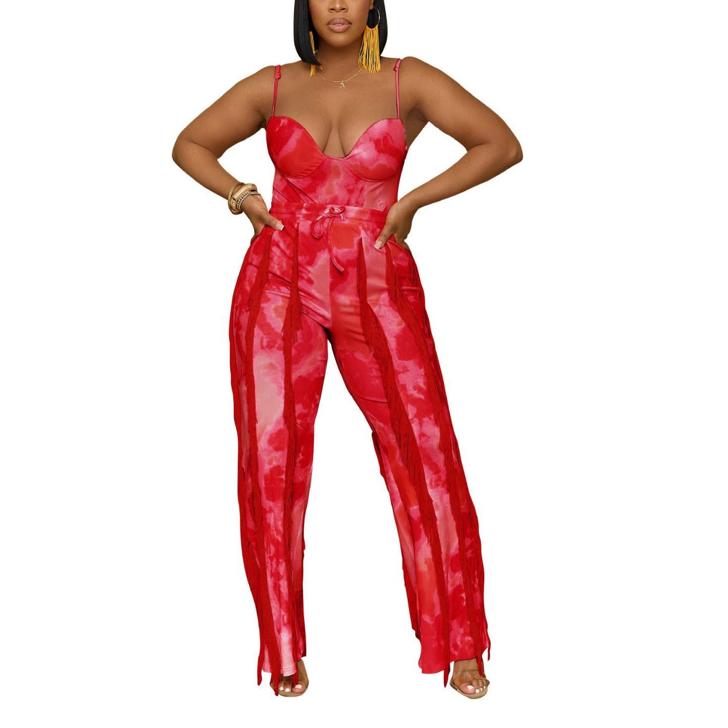 Woman modeling bold red tie-dye jumpsuit with sheer panels from FashionRay on white background