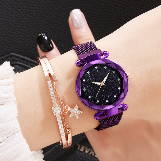 Woman's wrist with a purple starry watch and rose gold crystal bracelet from FashionRay