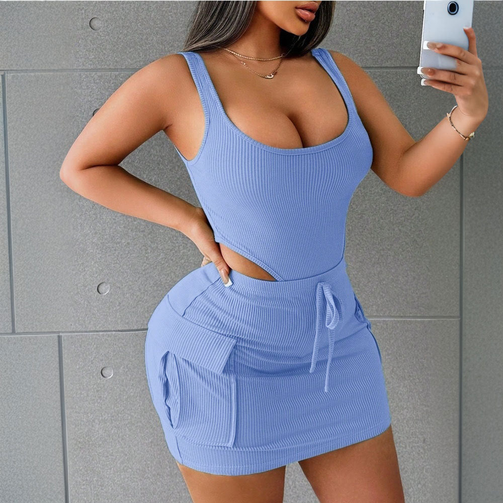 Woman modeling trendy blue ribbed cutout mini dress with pockets from FashionRay