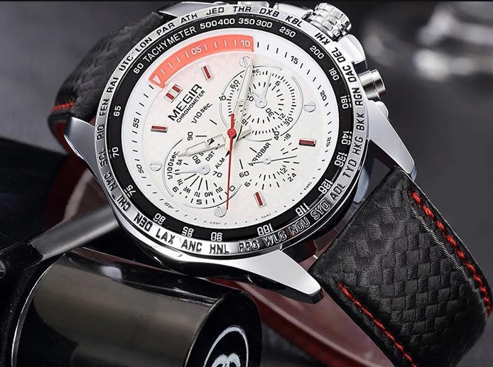 MEGIR chronograph watch with white dial, black bezel, and black leather strap, featured at FashionRay