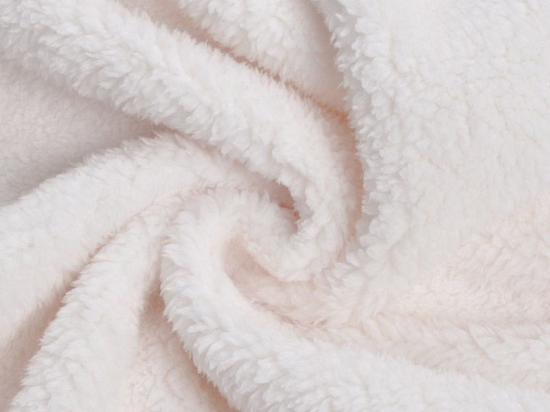 Soft white fleece fabric texture, cozy material from FashionRay for comfortable style