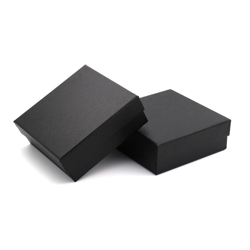 Two black square jewelry boxes on a white background, FashionRay packaging