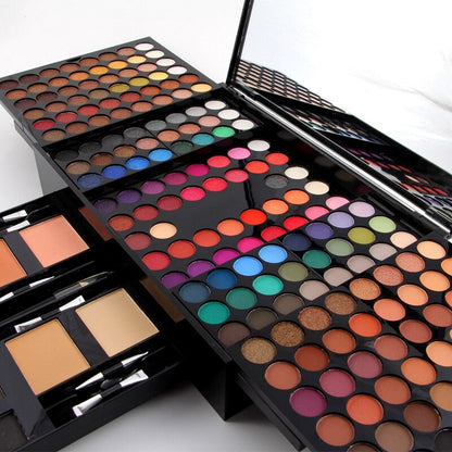 Colorful makeup palette set with eyeshadows, blushes, and mirror for bold FashionRay looks