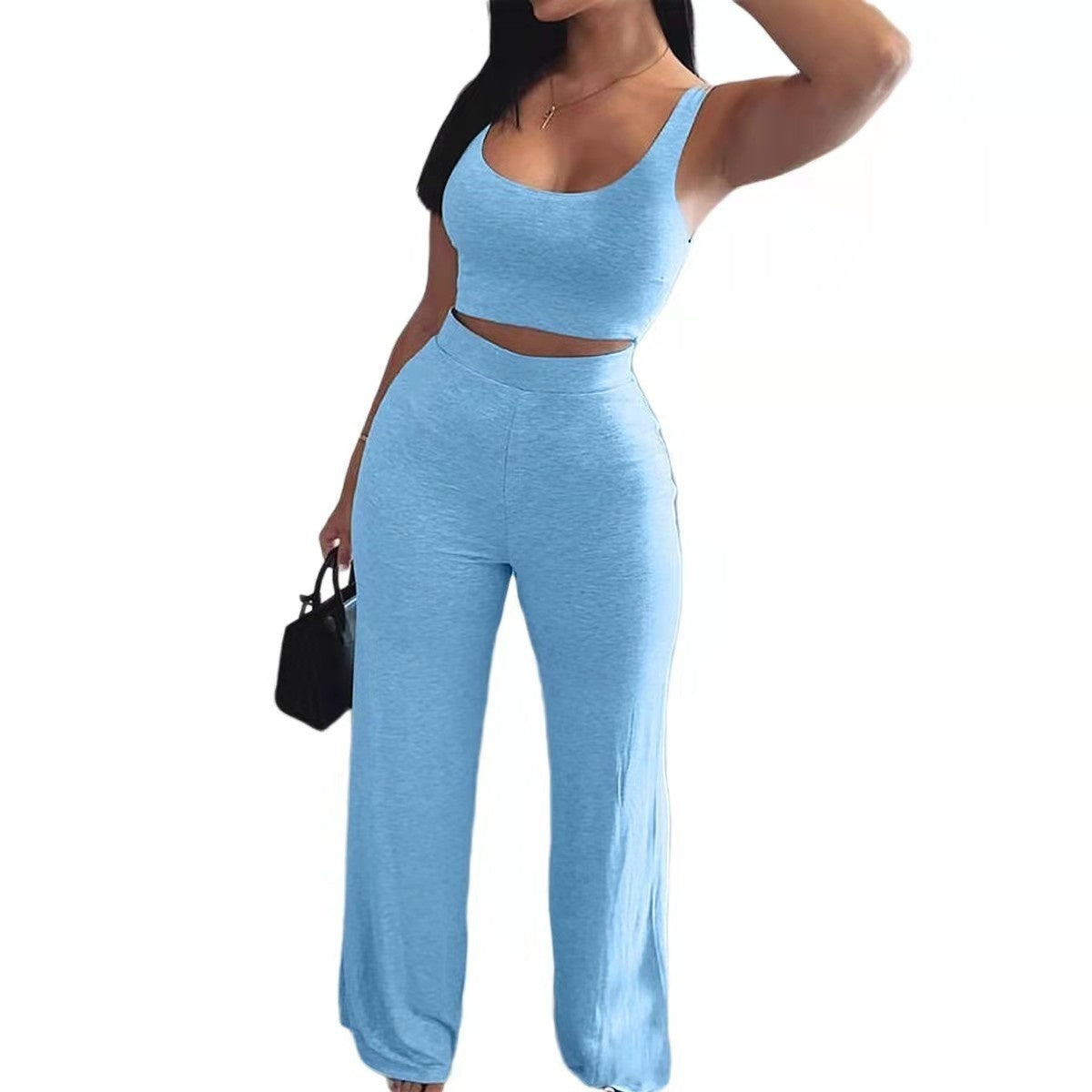 Woman wearing a trendy light blue two-piece lounge set, FashionRay comfortable fashion