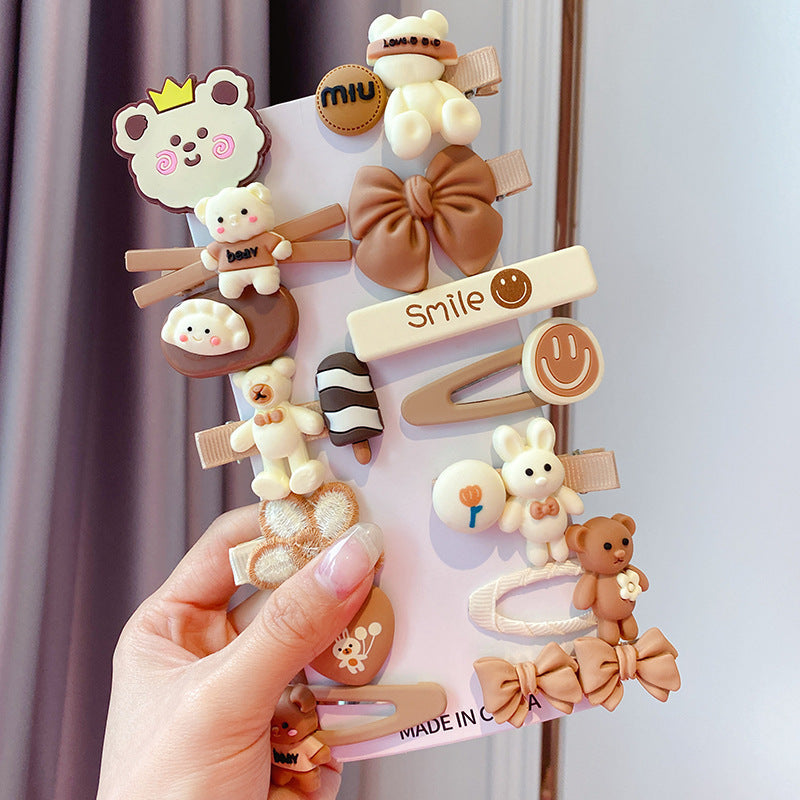 Cute brown and cream animal hair clips set with bears, bows, and smiley faces from FashionRay