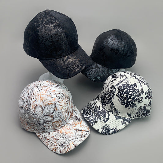 FashionRay stylish baseball caps with bold floral and leaf prints on a grey background